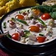 Raita – Indian-style Yogurt Salad with Tomatoes, Peanuts and Mint